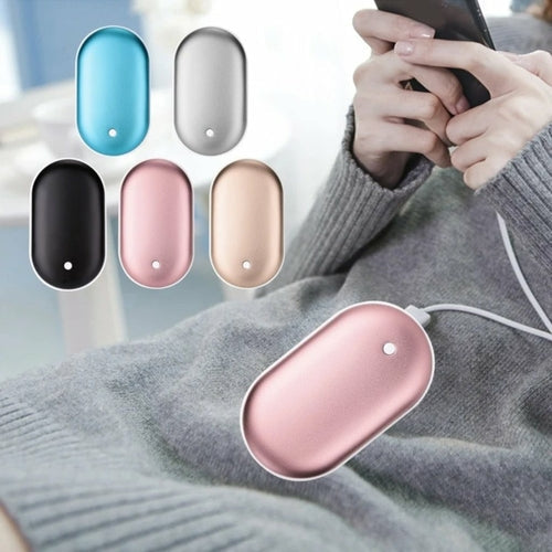 Les trois coloris du chauffe-mains USB : bleu, argent et rose doré